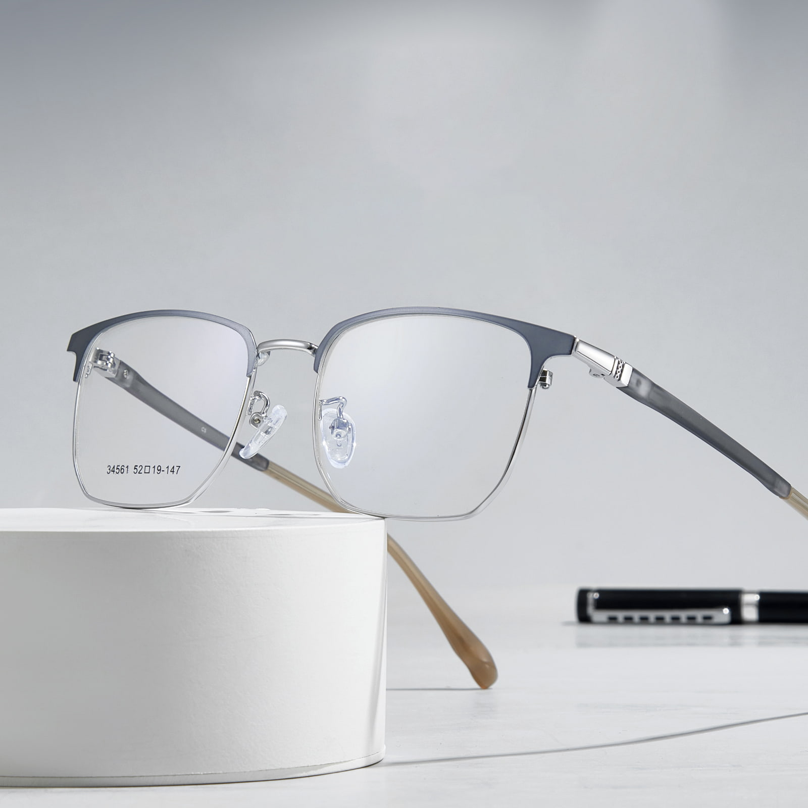 34561 Gafas de aleación de patillas de silicona para caballero de negocios