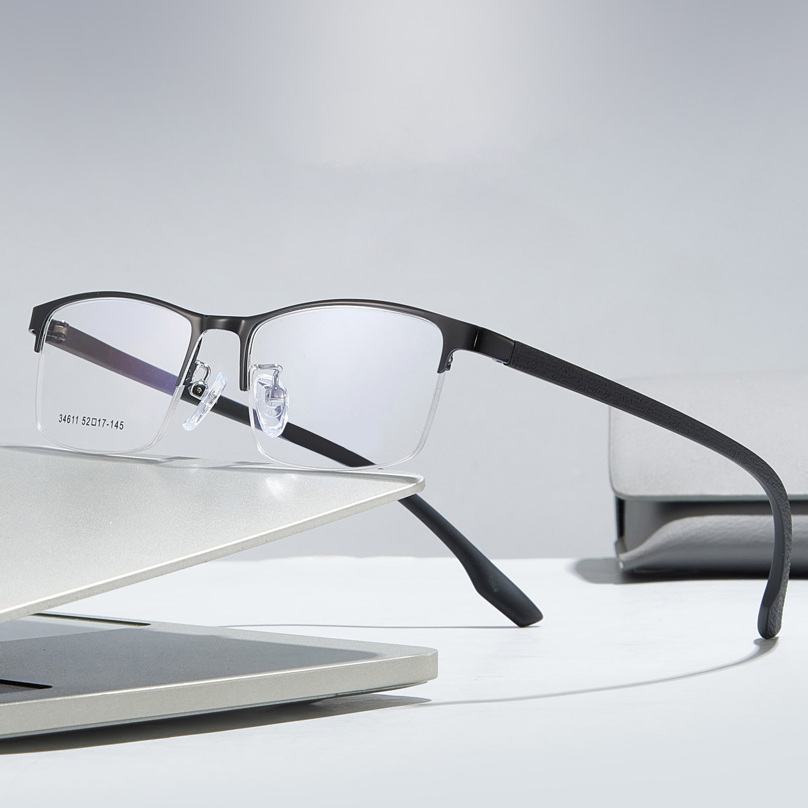 34611 Gafas minimalistas de aleación hipoalergénicas de media montura