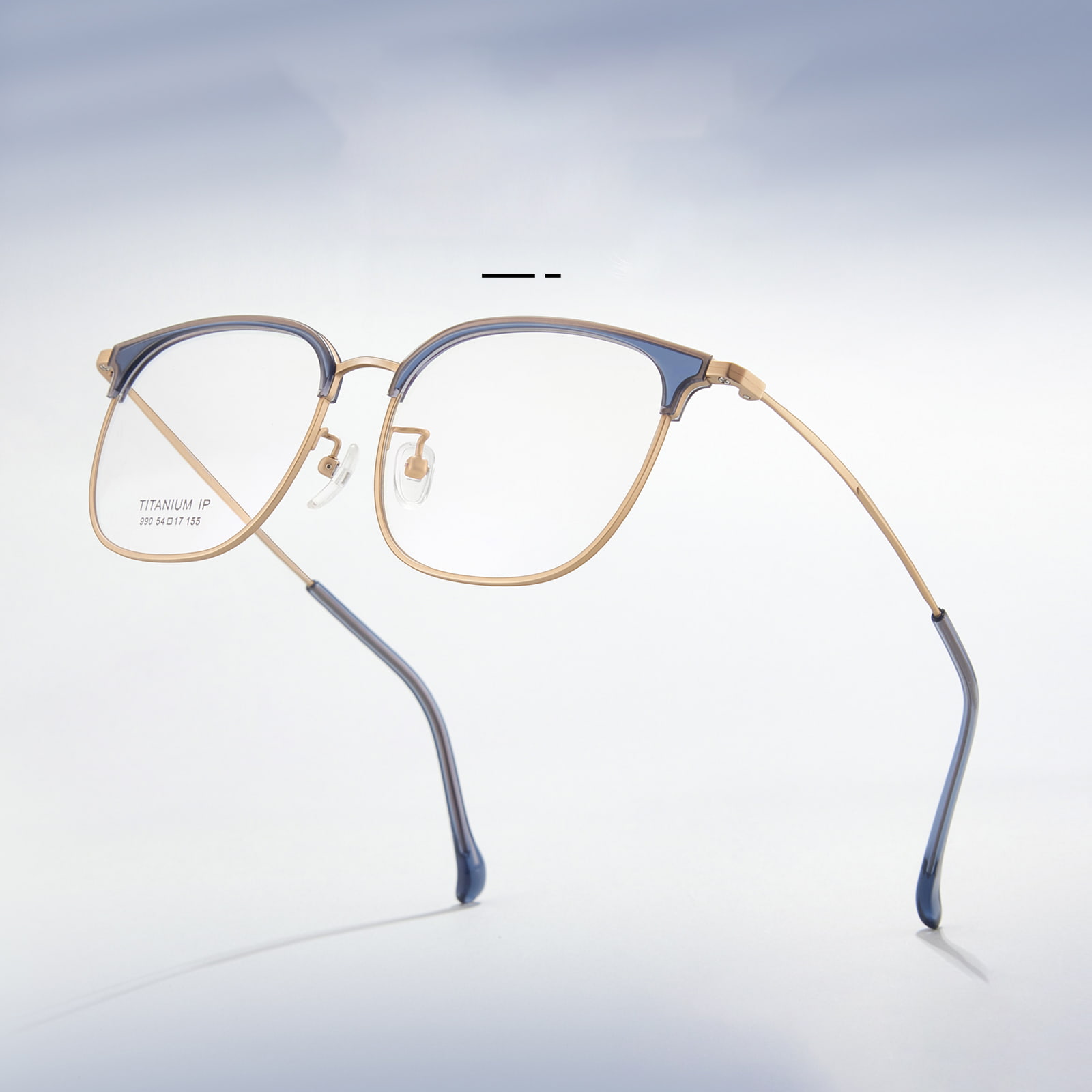 Gafas de titanio puro resistentes al sudor para desplazamientos con montura de cejas 990