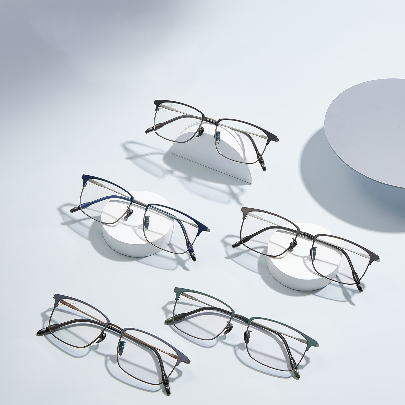 9727 Gafas de titanio puro con montura ultrafina en forma de ceja de dos tonos