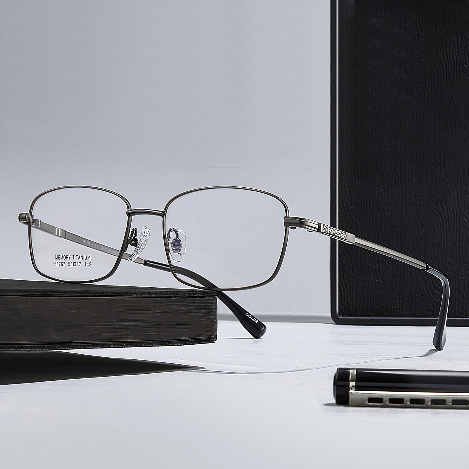 34767 Gafas de aleación antiextrusión de titanio con memoria en el lugar de trabajo