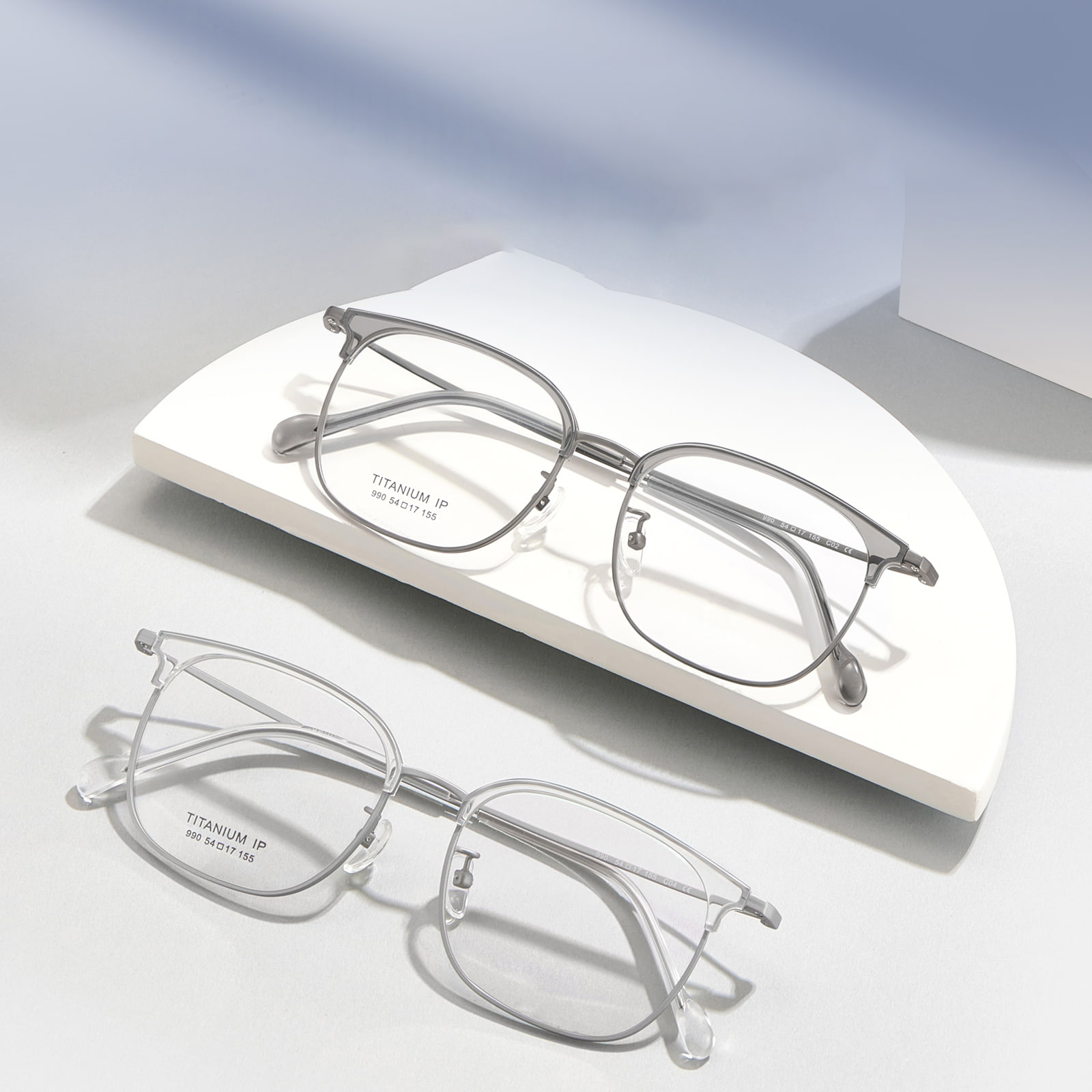 Gafas de titanio puro resistentes al sudor para desplazamientos con montura de cejas 990