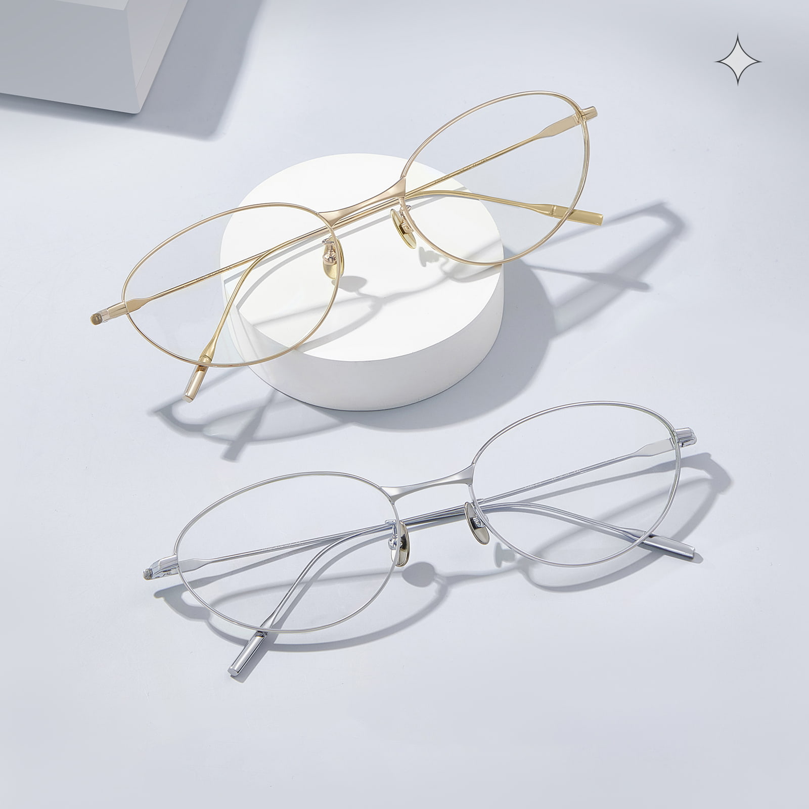 Gafas de titanio puro, ricas en color ojo de gato, ovaladas y descoloridas