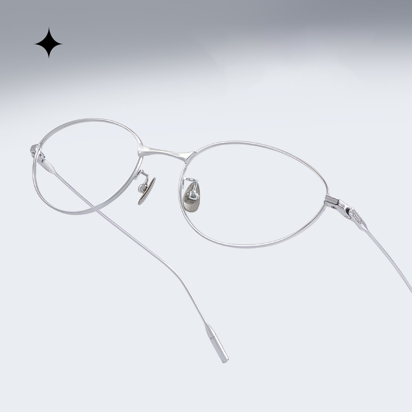 Gafas de titanio puro, ricas en color ojo de gato, ovaladas y descoloridas
